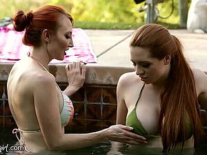 Pervert Redhead MILF Bonds With Her Stepdaughter By Making Her Squirt By The Pool
